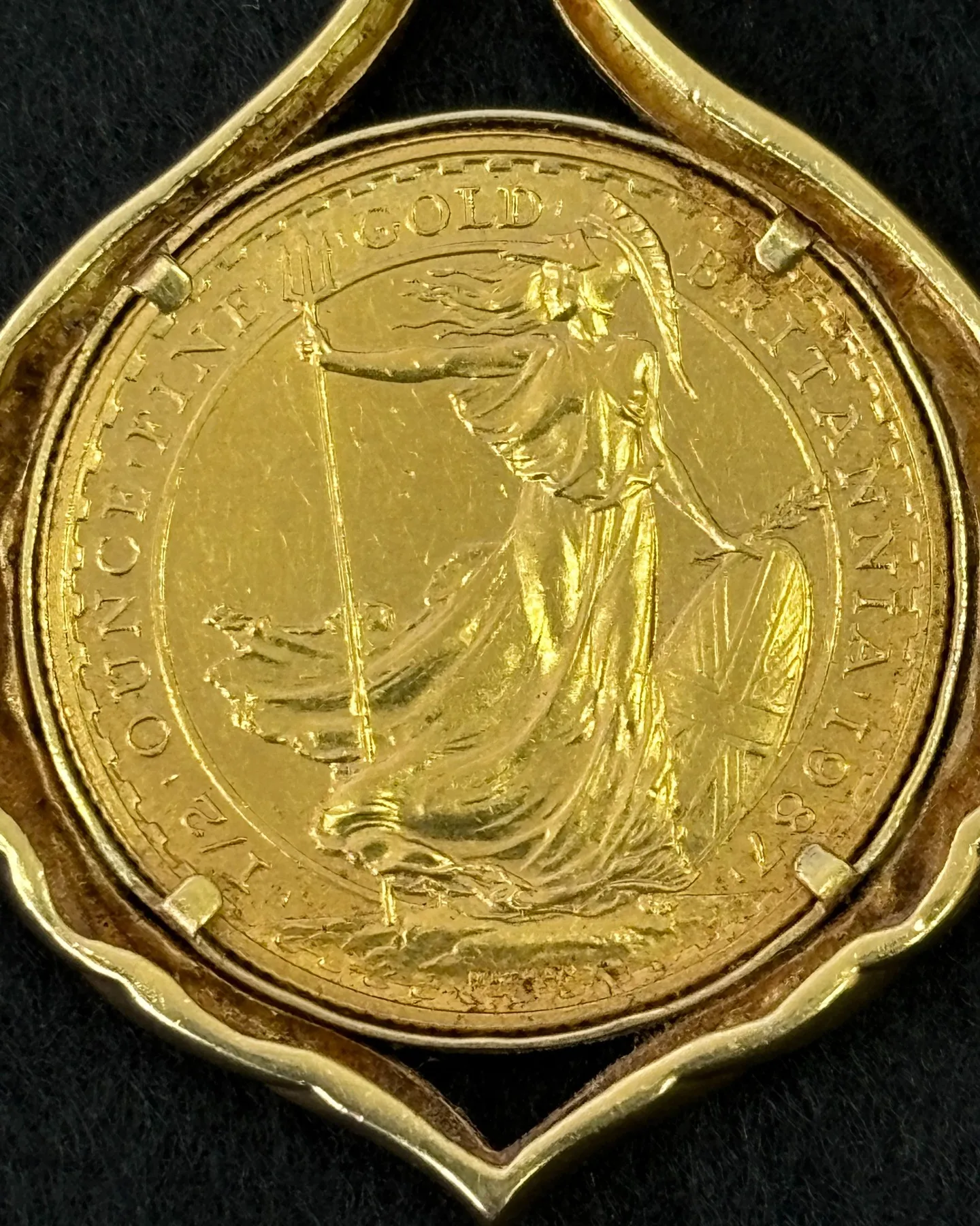 金の喜平ネックレスとコインのペンダントトップをお買取りさせて...