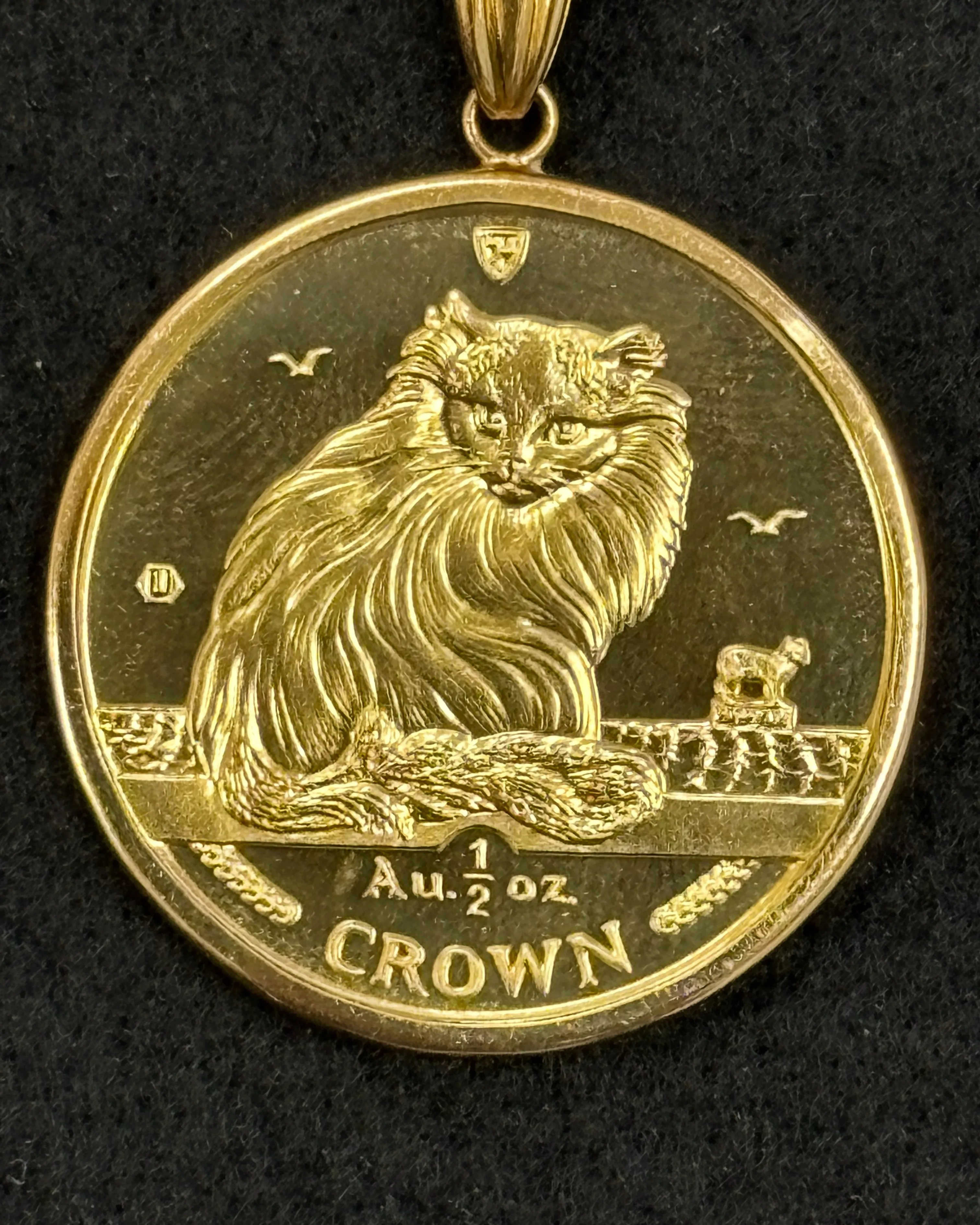 金のネックレスとマン島キャット金貨のペンダントトップをお買取...