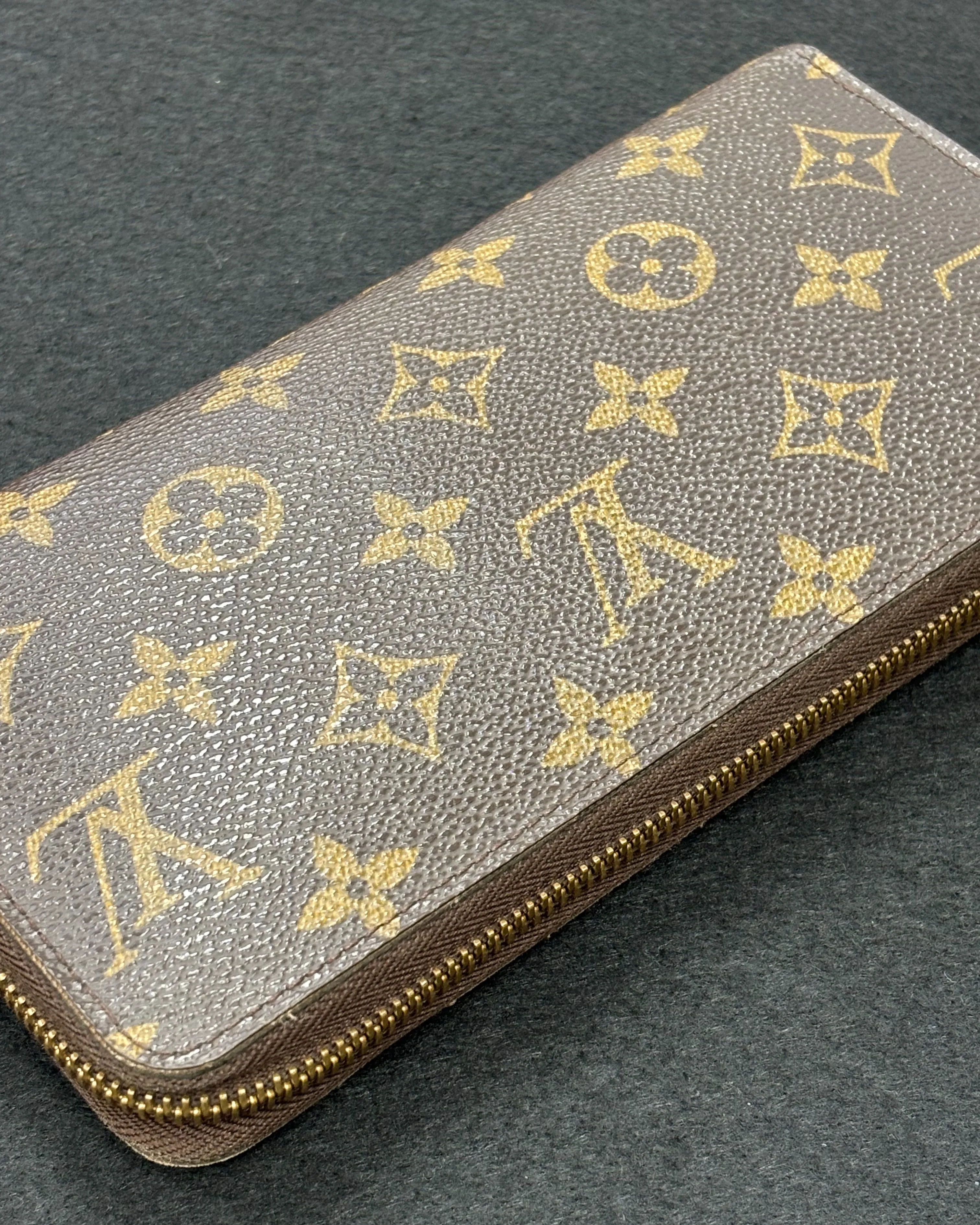 ヴィトンの長財布「モノグラム ジッピー ウォレット」をお買取...